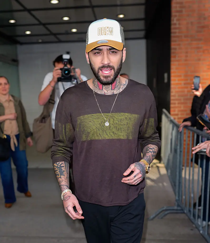 One Direction star Zayn Malik allegedly punched former bandmate Louis Tomlinson in the face after making a 'derogatory comment' (Photo by XNY/Star Max/GC Images)