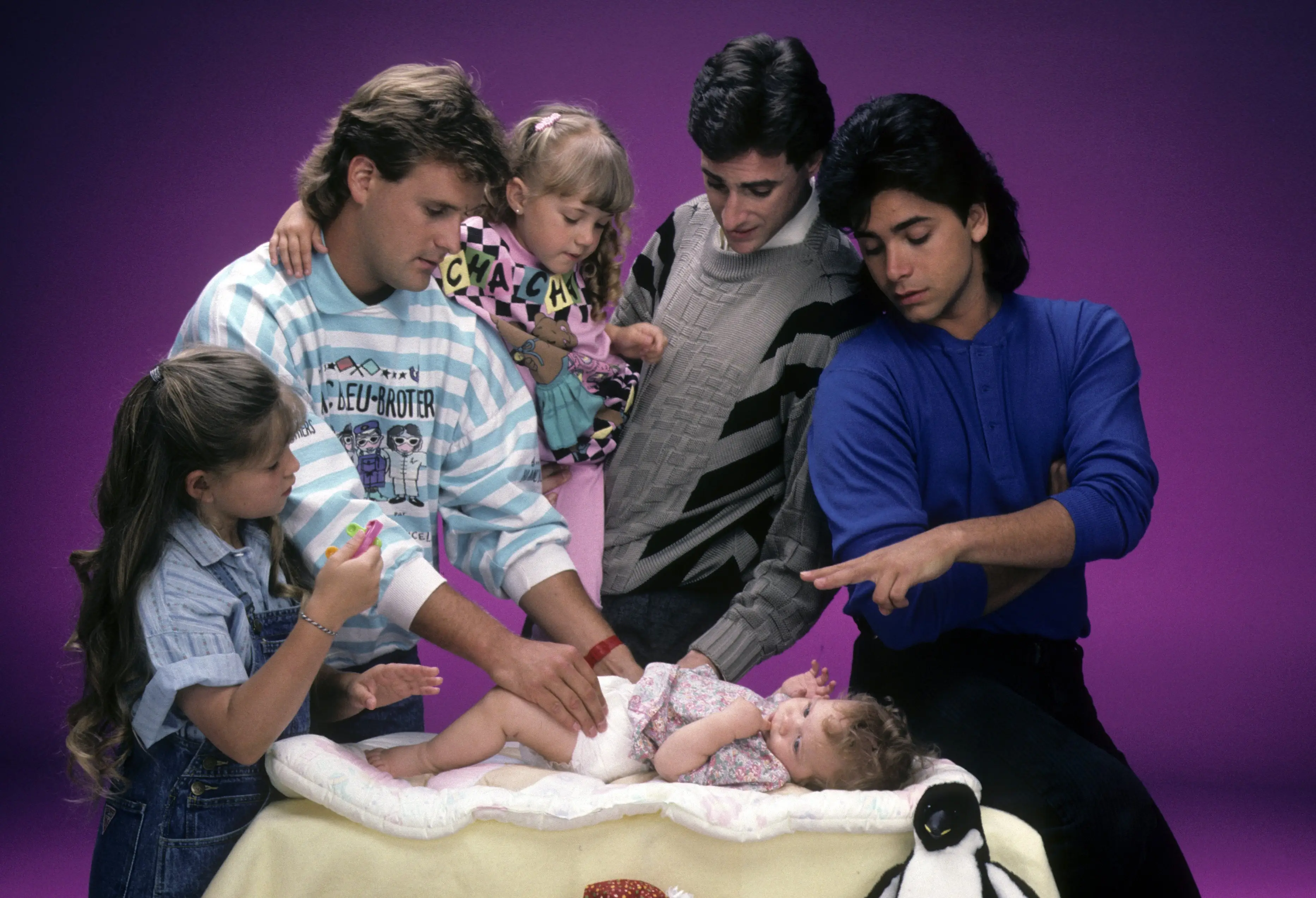 'Full House' saw millions tune in to watch three men try their best to raise three daughters (ABC Photo Archives/Getty Images)