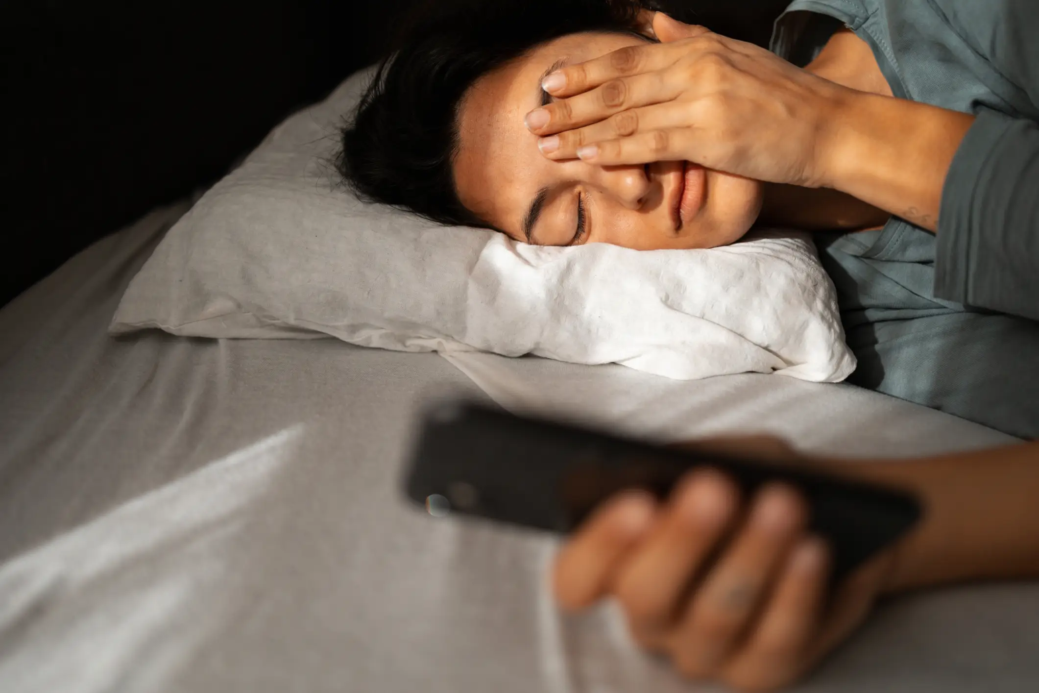 There are little things you can do and avoid to ensure a good night's sleep - such as putting down the phone! (Getty Stock Image)