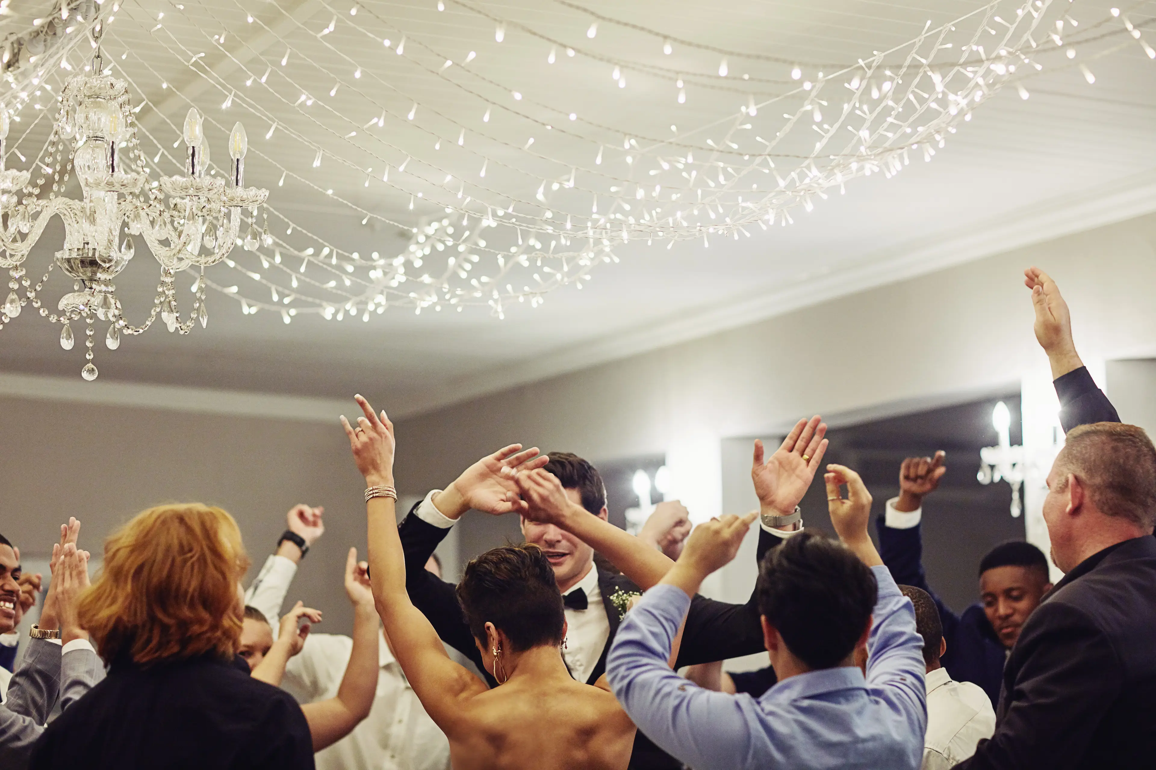 What song gets you onto the dance floor at a wedding? (Getty Stock Images/ LumiNola)