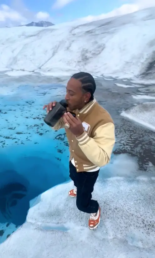 The rapper took a sip of the glacier water. (TikTok / ludacrisdtp)