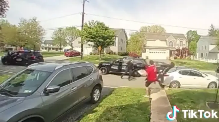 The pizza delivery driver stuck his foot out to trip up the suspect fleeing police.