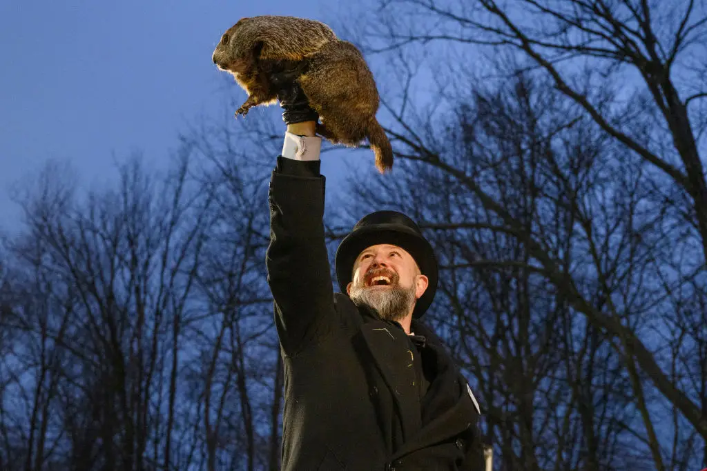 What began as folklore now draws crowds willing to trust a groundhog (Jeff Swensen/Stringer/Getty Images)