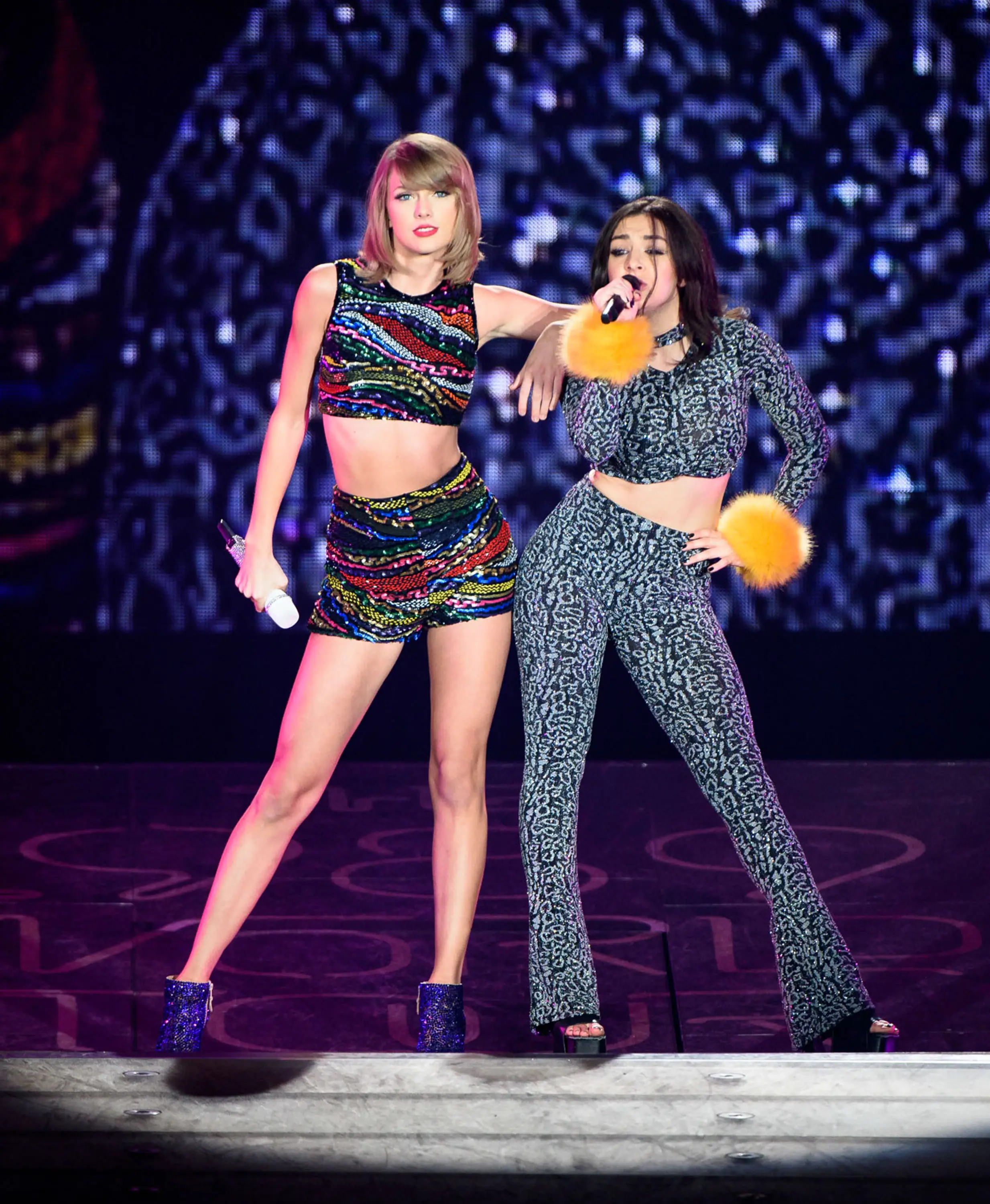 Taylor Swift and Charli XCX seen performing together in 2015. (George Pimentel/LP5/Getty Images for TAS)