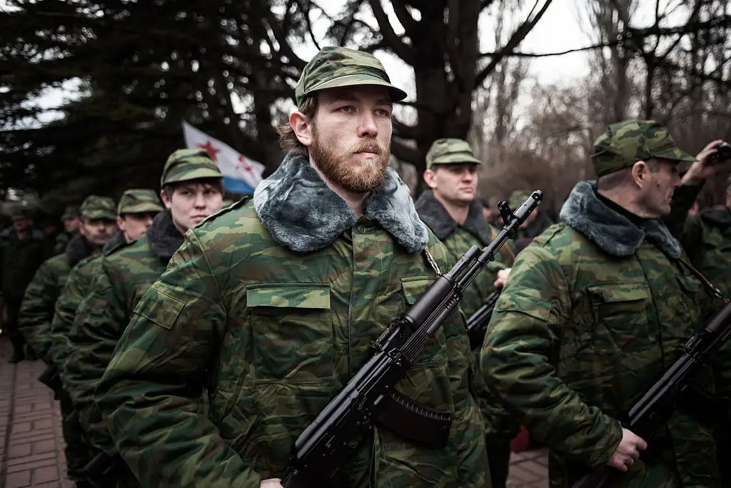Vladimir Putin called them 'self-defense' groups (Photo by RONNY ROMAN ROZENBERG / AFP via Getty Images)