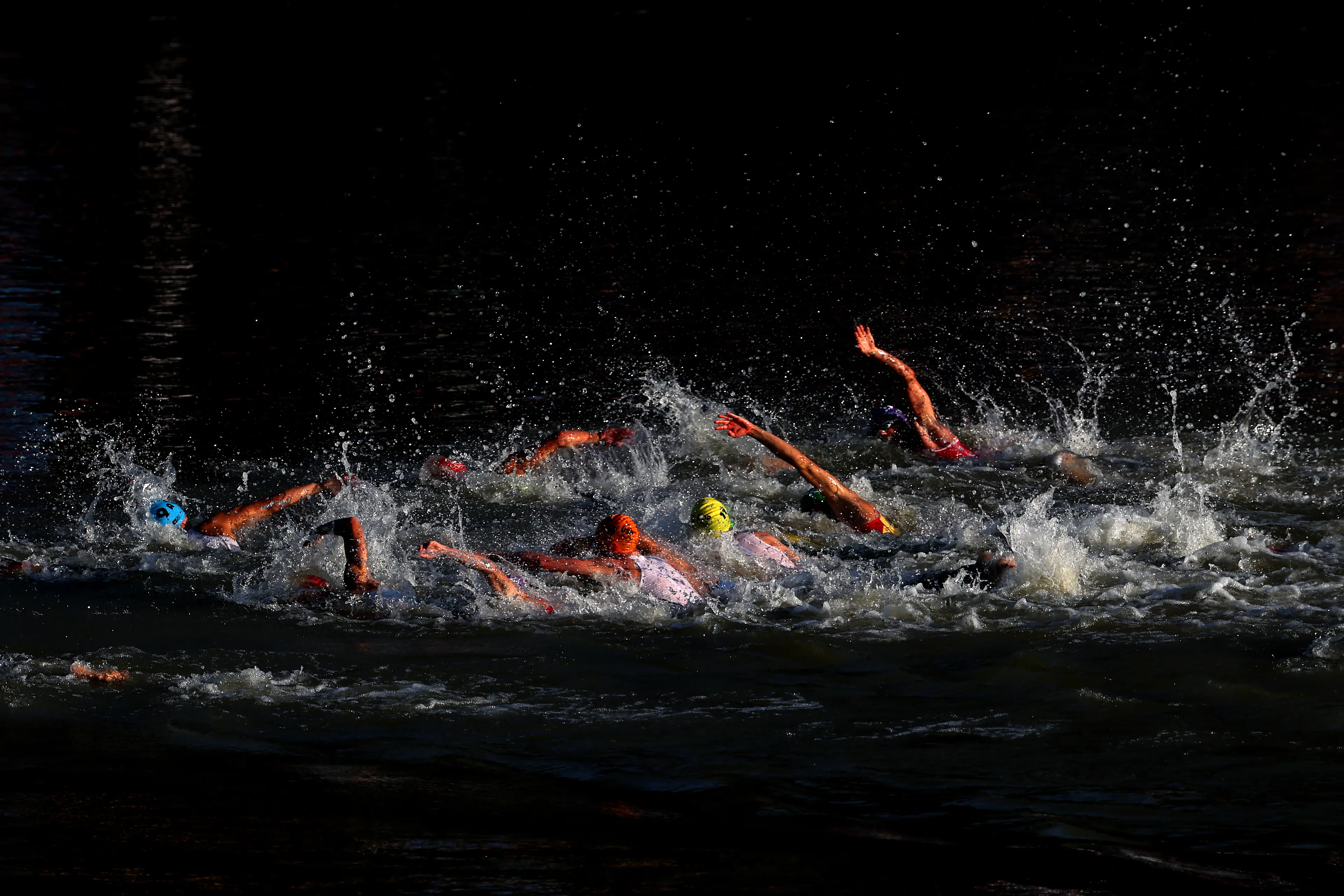 The swimming section of the mixed relay took place in the Seine. (Al Bello/Getty Images)