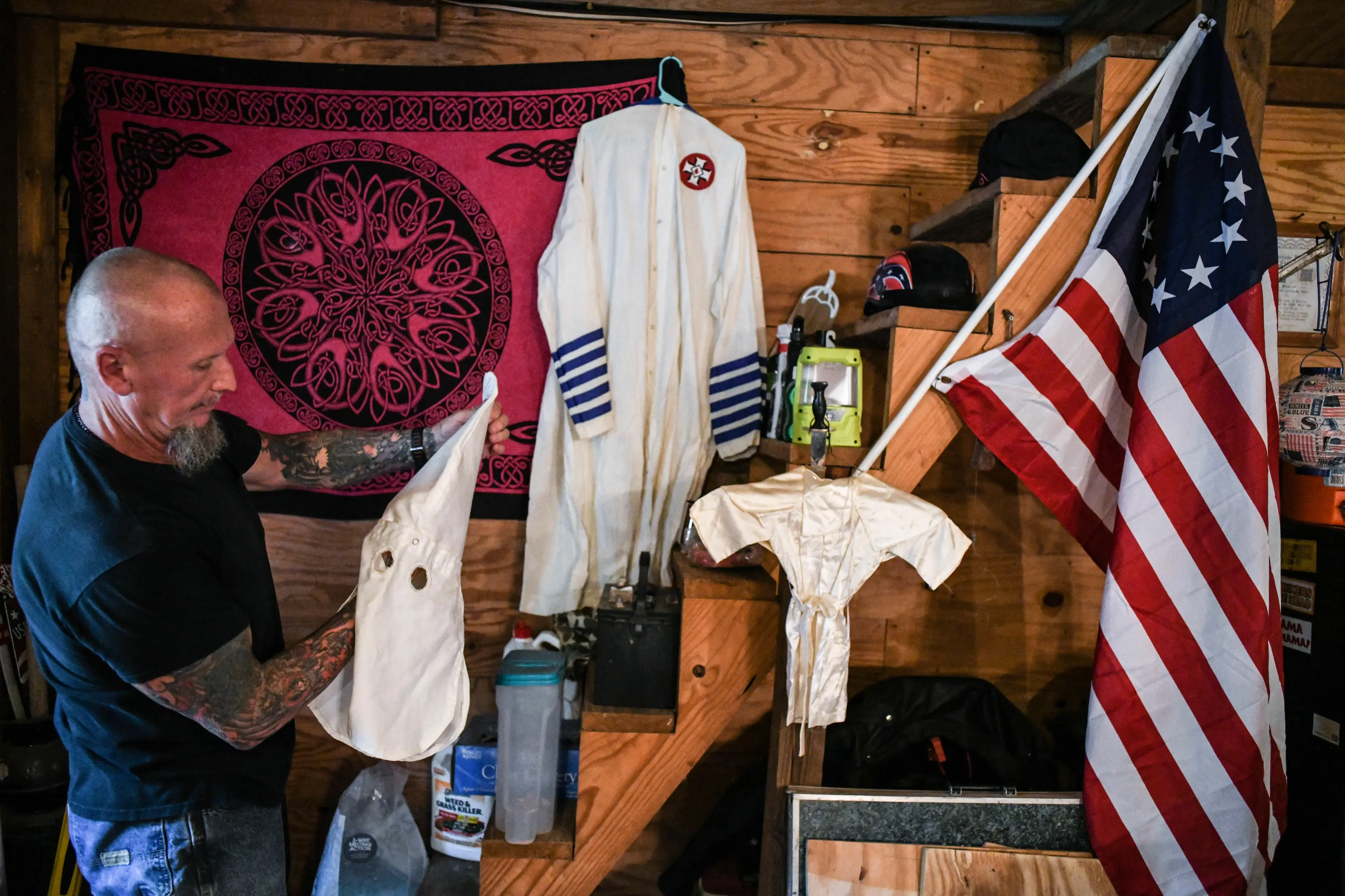 Chester Doles displays his Klan robes (Alamy)