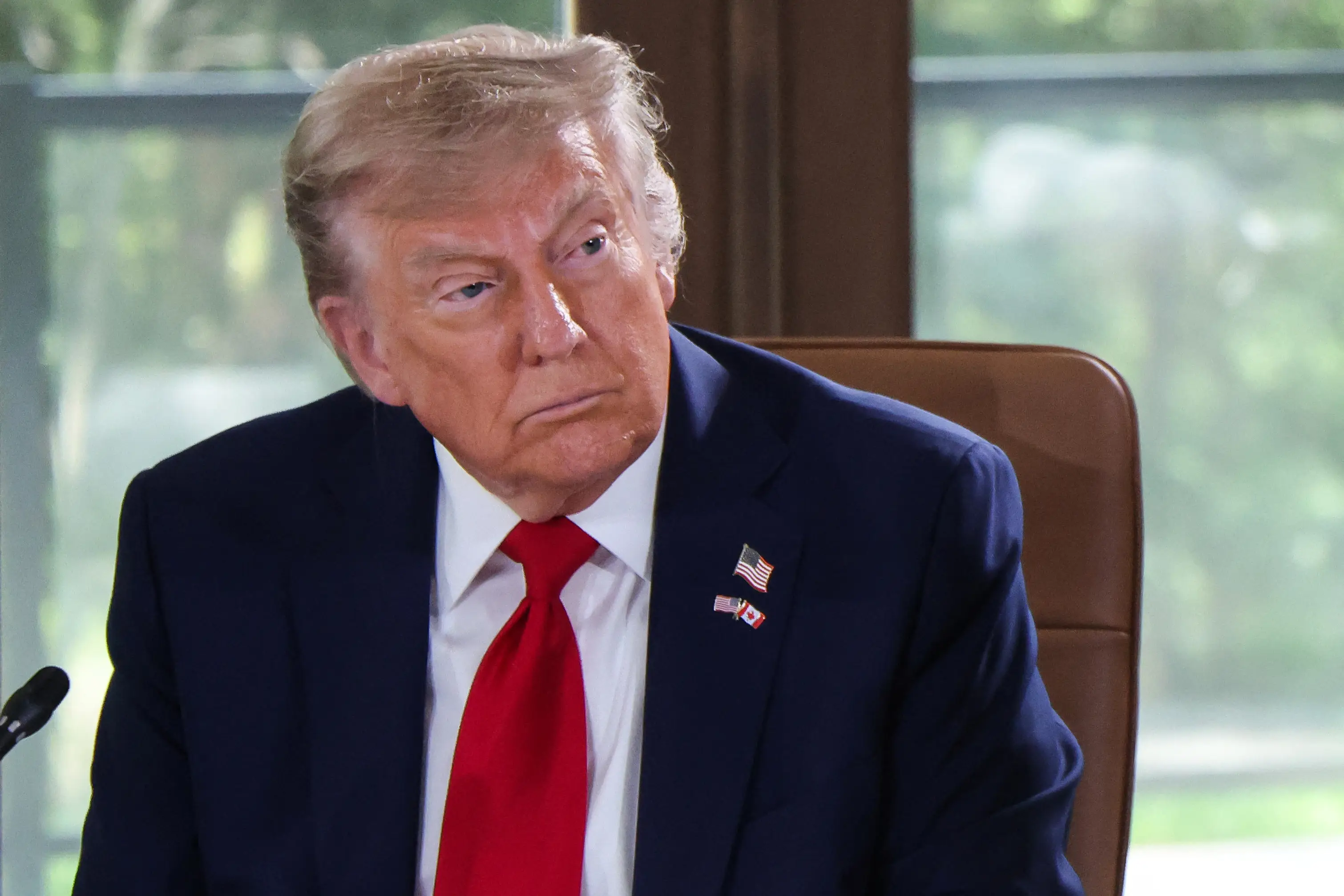 Donald Trump has been asked if the US will get involved (LUDOVIC MARIN/POOL/AFP via Getty Images)