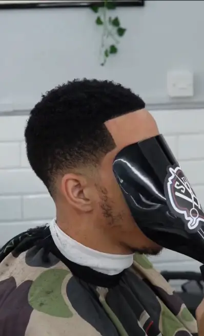 Devin Booker was forced to deny claims he wearing a wig. X/@mymixtapez