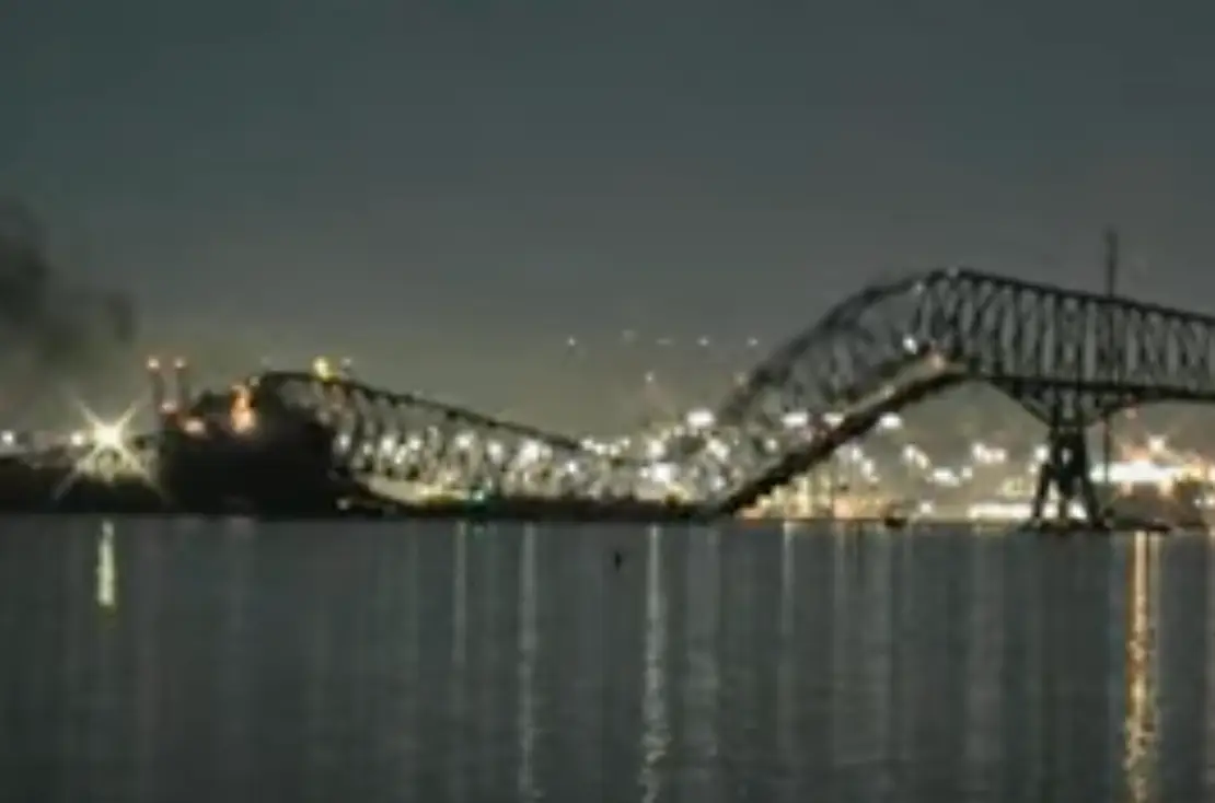 The bridge collapsed after being hit by the cargo ship.