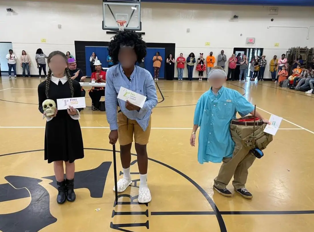 The little boy finished behind a boy dressed as an old man and a girl dressed as Wednesday Addams (Eufaula City Schools)