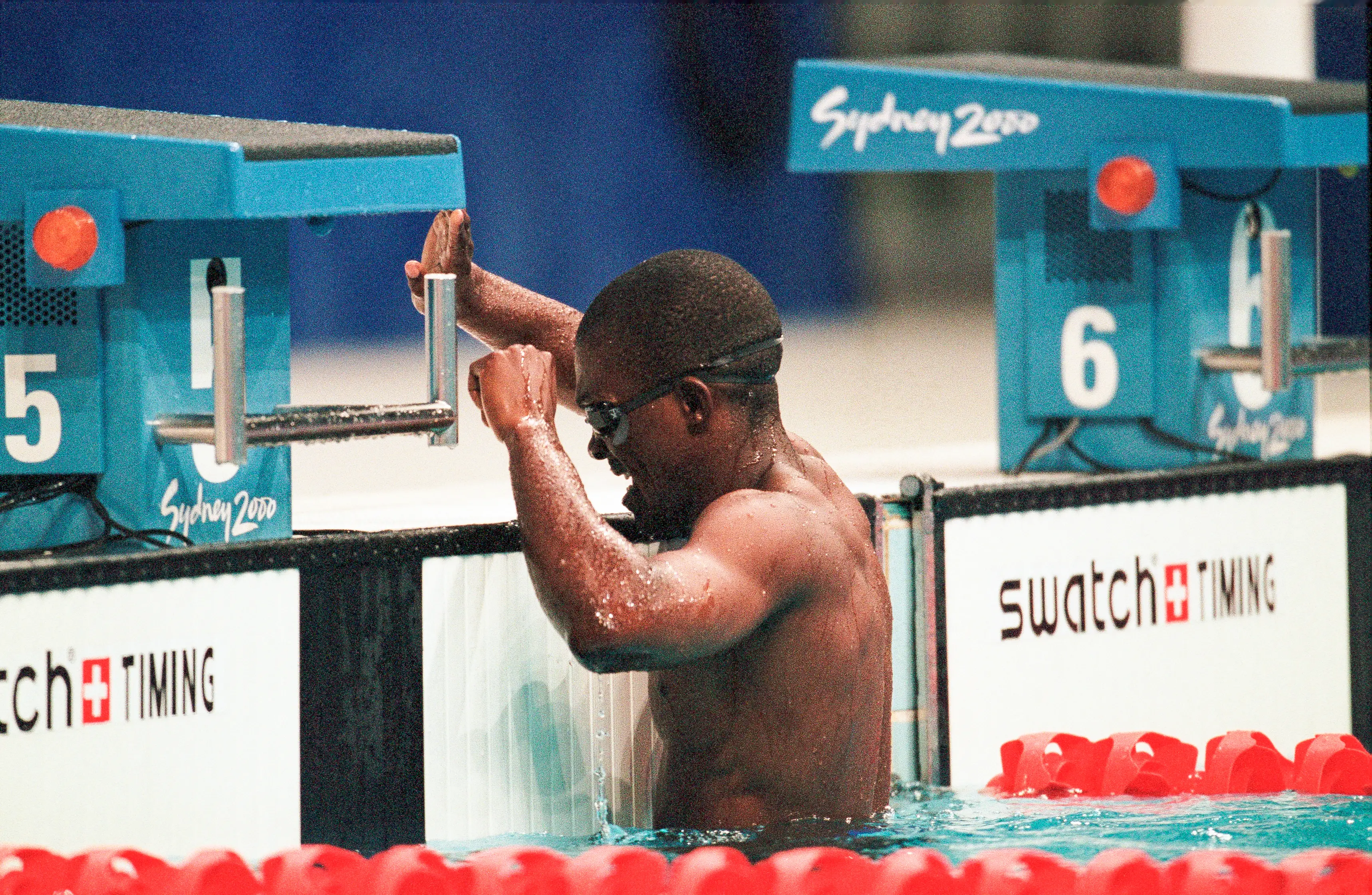 Eric celebrates after his 100m race. (Simon Bruty/Anychance/Getty Images)