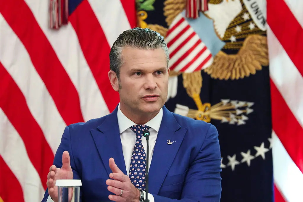 Secretary of War Pete Hegseth attended a December 2025 cabinet meeting where a placard listed his role as ‘SSecretary of War’. (Samuel Corum/Sipa/Bloomberg via Getty Images)