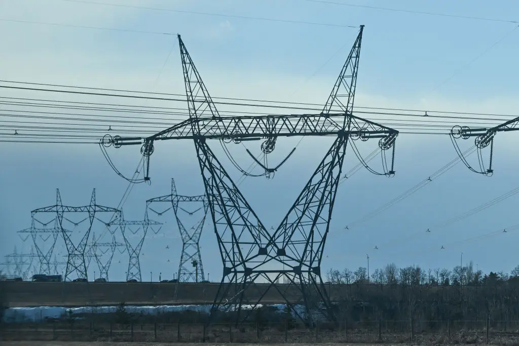 A view of electric poles and wires stretching along Edmonton's Anthony Henday Drive in Edmonton, Alberta, Canada (Artur Widak/NurPhoto via Getty Images)