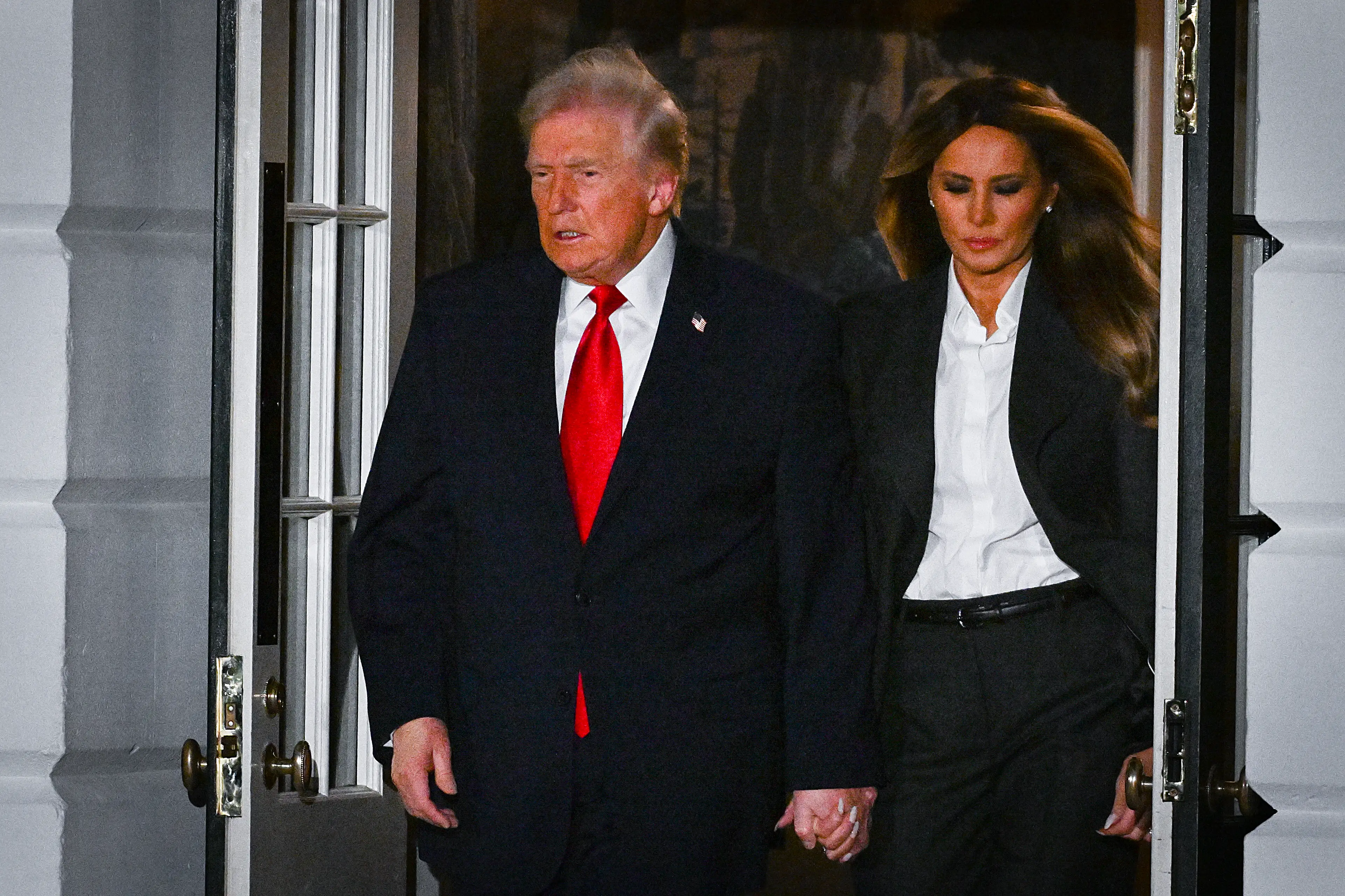 U.S. President Donald Trump and first lady Melania Trump depart the White House on way to the U.S. Capitol to give his State of the Union address (Roberto Schmidt / Getty Images)