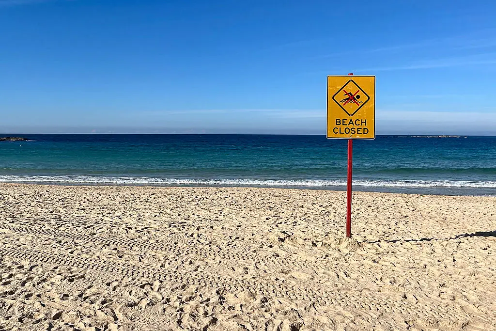 The family of a Sydney teacher who was attacked by a shark while swimming in Coogee says she remains on life-support and have started a GoFundMe. (Photo by OLIVER HOTHAM / AFP via Getty Images)(