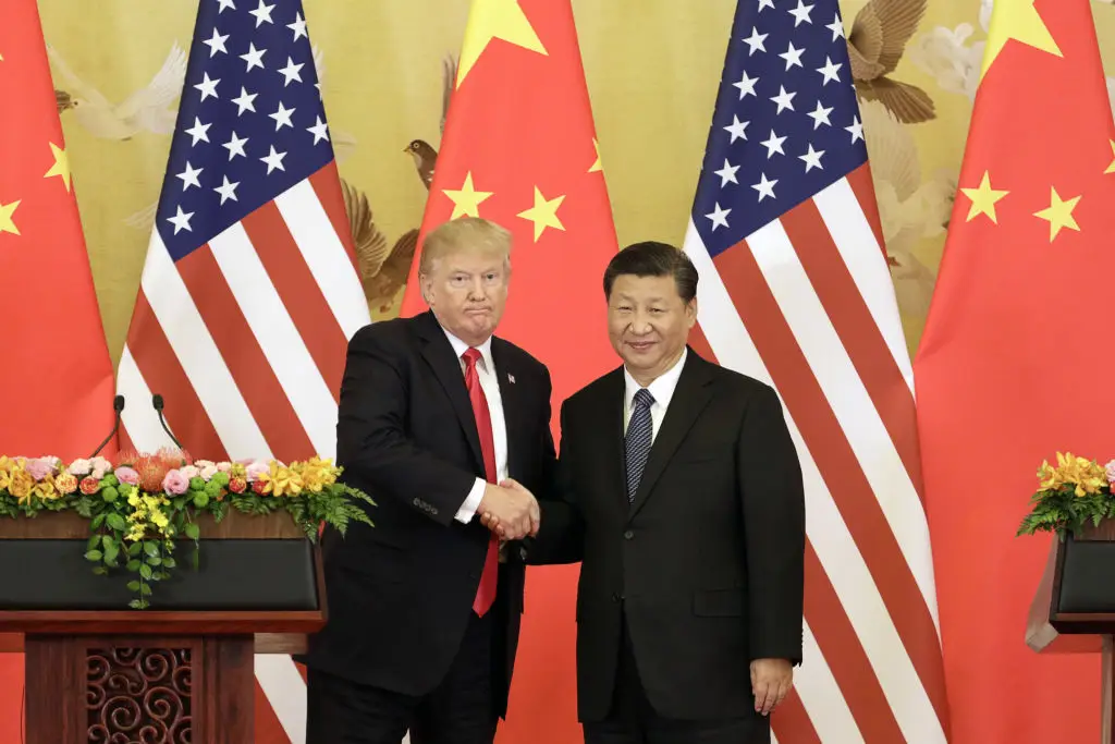 The trade deal brokered between President Donald Trump and Chinese President Xi Jinping, both pictured here in 2017, has allegedly been broken by China (Qilai Shen/Bloomberg via Getty Images)