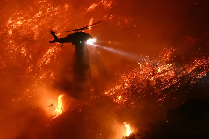 The fires saw vast resources deployed to bring them under control (PATRICK T. FALLON/AFP via Getty Images)