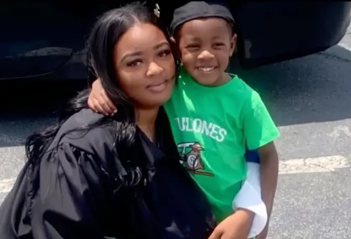 Adriana with her son before her medical episode (11Alive/YouTube)