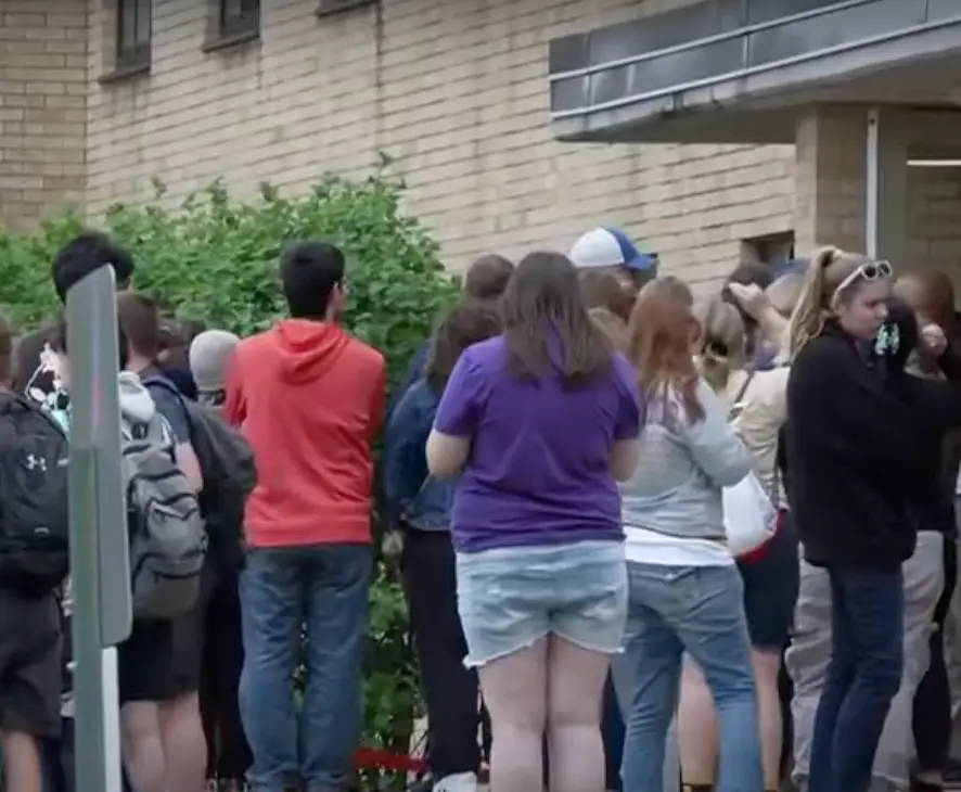 Students were kept out of the Wilgus Hall building after the bodies were discovered (News 3 Now)