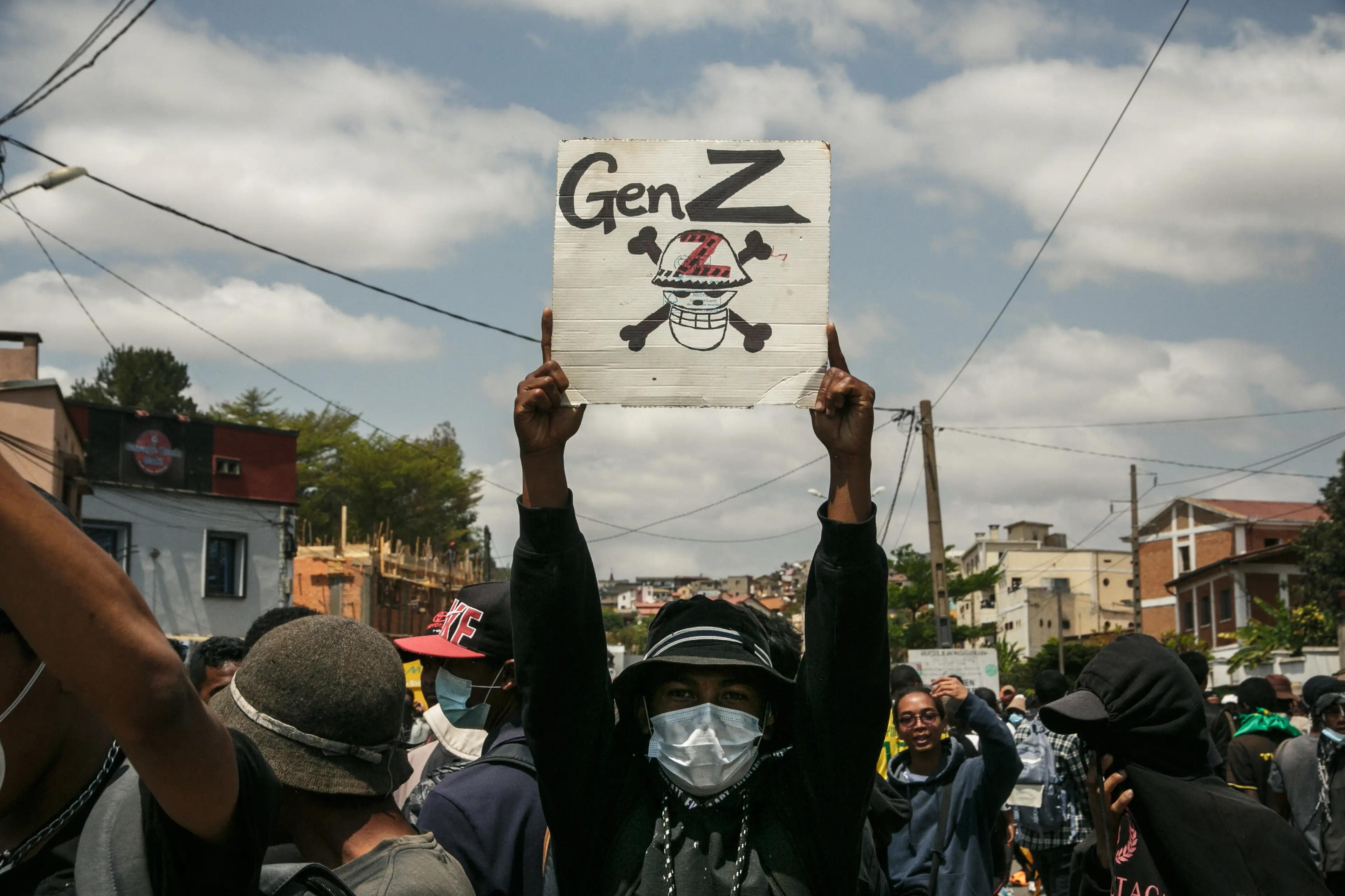 Protestors adopting signs for the 'Gen-Z protests' (RIJASOLO/AFP via Getty Images)