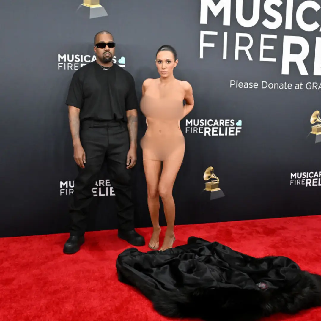 West and Censori pose in front of the discarded fur coat (Axelle/Bauer-Griffin/FilmMagic)