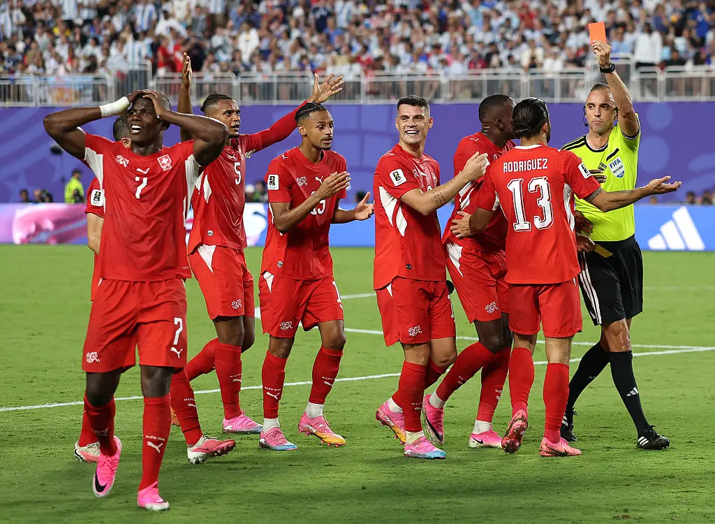 Under the new rule, if a player is booked or sent off but it's later established that the foul was actually committed by a player on the opposing team, officials are now permitted to reverse the decision and correctly punish the real offender. (Photo by Michael Regan - FIFA/FIFA via Getty Images)