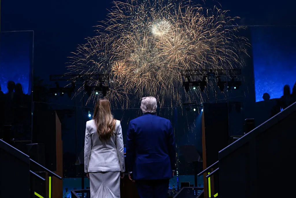 Melania and Trump watching the fireworks at the event (Doug Mills - Pool/Getty Images)