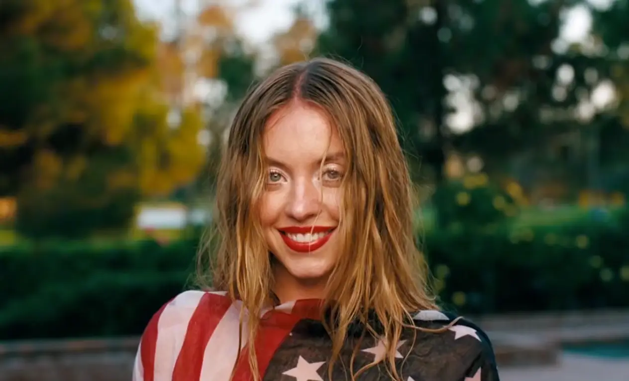 One shot sees Sweeney draped in an American flag (HBO)