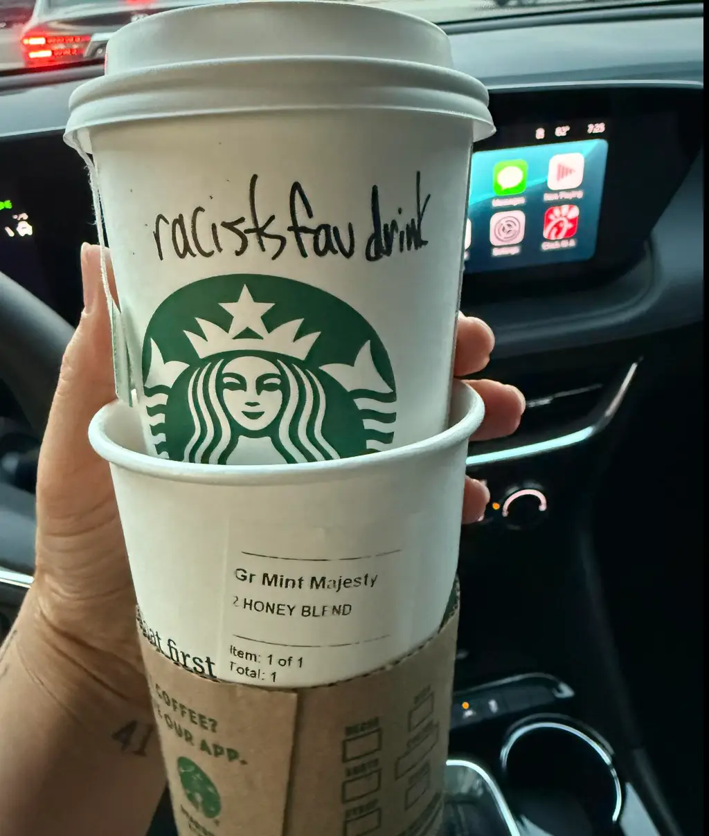 The woman claimed a Starbucks employee wrote the message before handing her the cup (Autmn Perkins/Facebook)