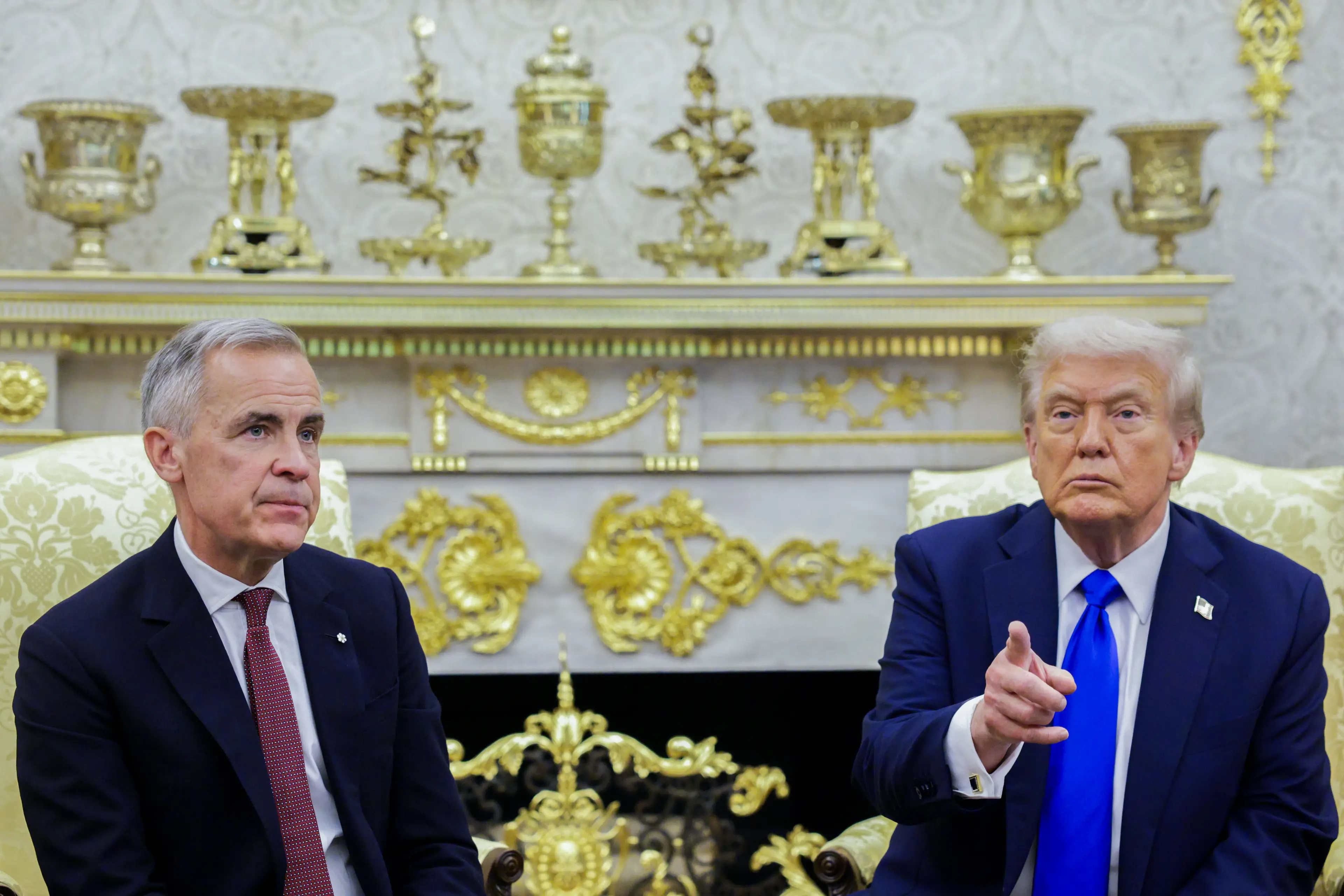 Mark Carney admitted there's a risk Donald Trump will order military action against Canada (Shawn Thew/EPA/Bloomberg via Getty Images)