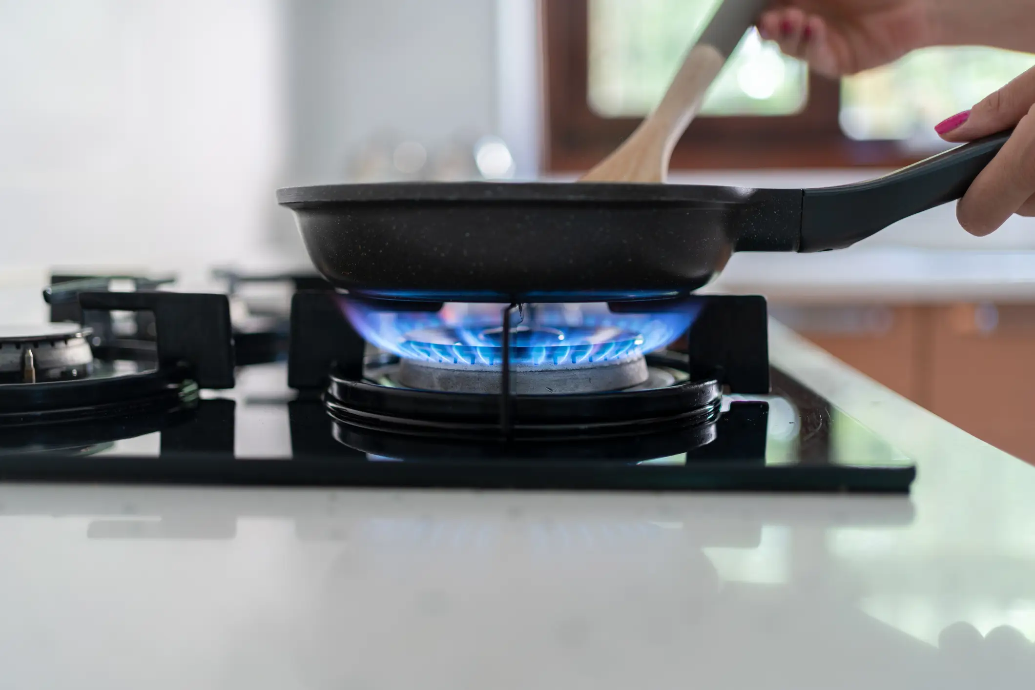 Cooking on a gas stove releases benzene into the air, a known carcinogen (Getty stock)