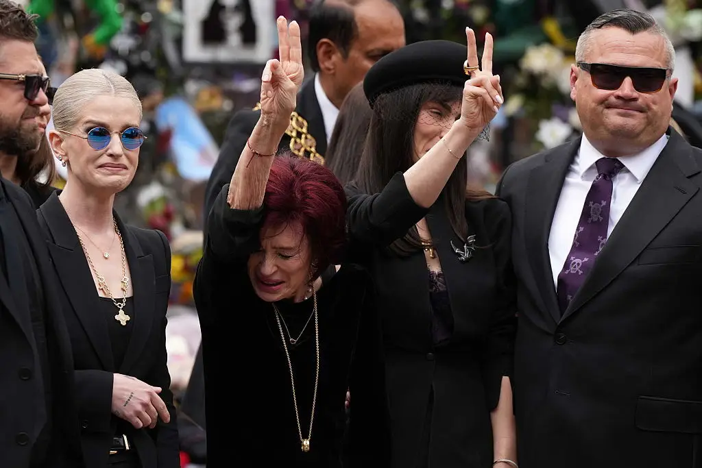 Sharon and her children gathered to pay tribute to Ozzy, with the widow showing two peace signs (Loannis Alexopoulos/Anadolu via Getty Images)