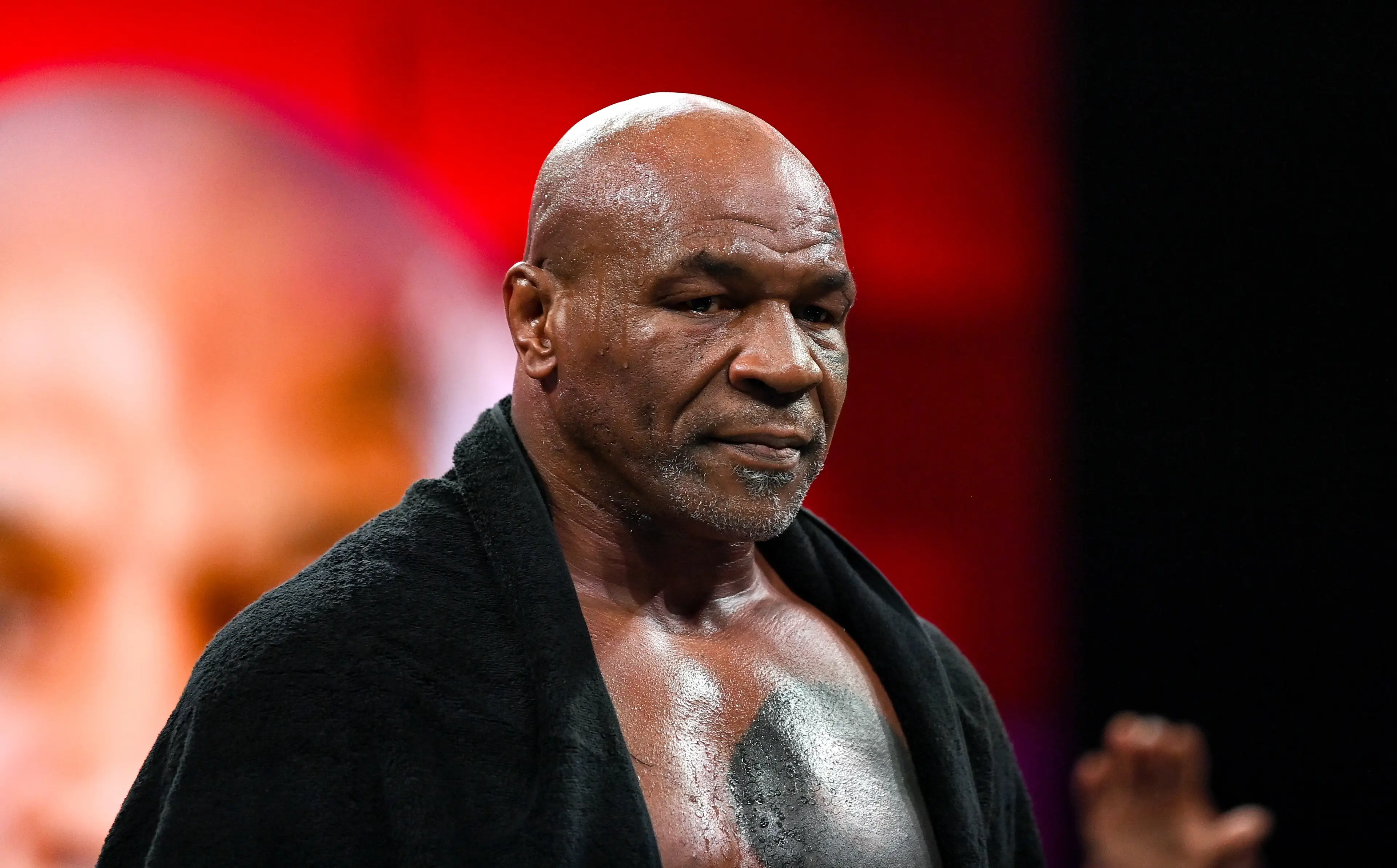 Mike Tyson enters the ring on Friday (Stephen McCarthy/Sportsfile via Getty Images)