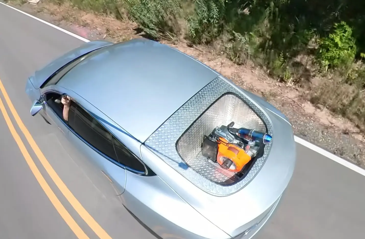 YouTuber Matt Mikka added a gas generator to his Tesla to see if he could take it on a road trip.
