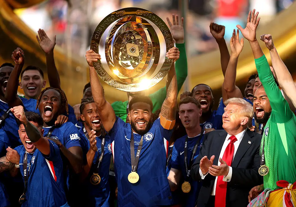 Trump didn't step aside when the victorious team lifted the trophy (Carl Recine - FIFA/FIFA via Getty Images)