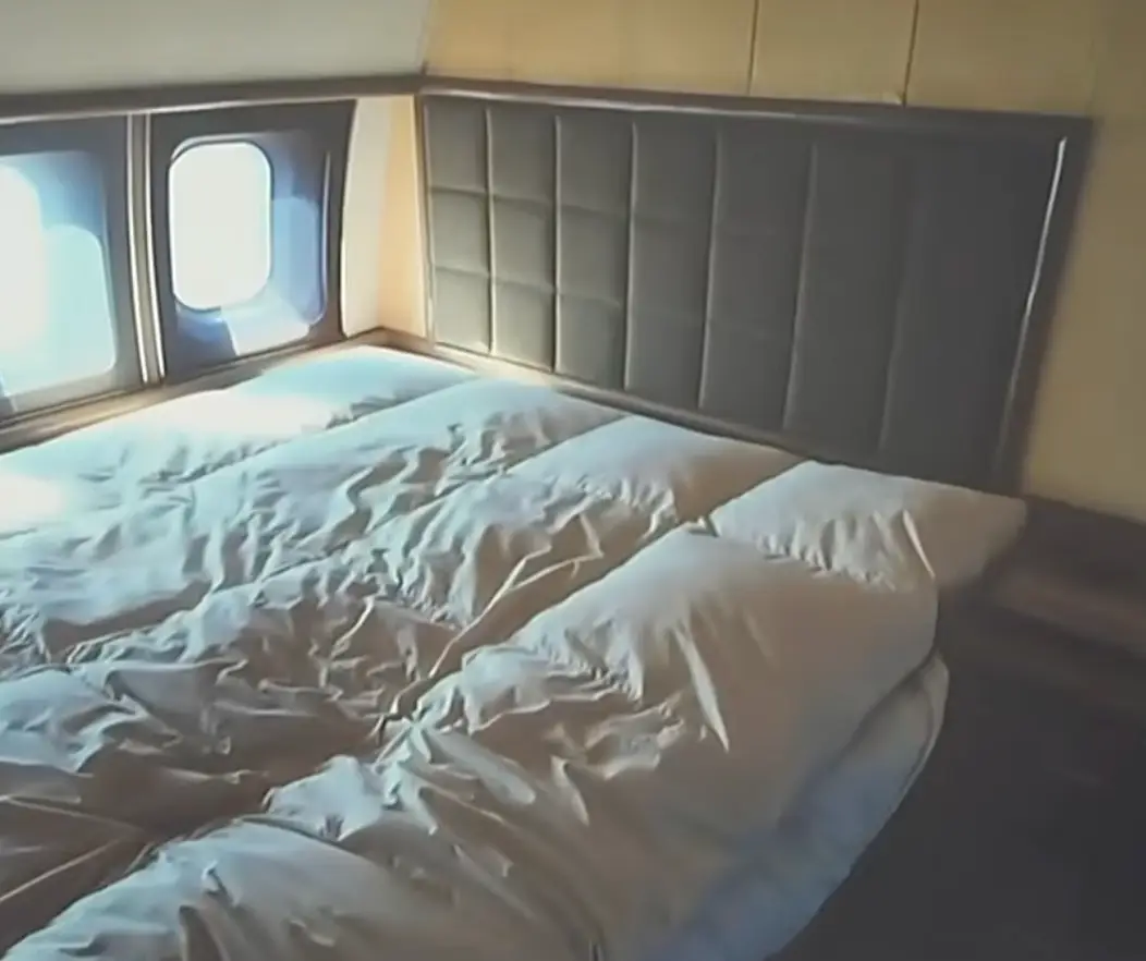 The queen-size bed in the Lolita Express (News4Jax)