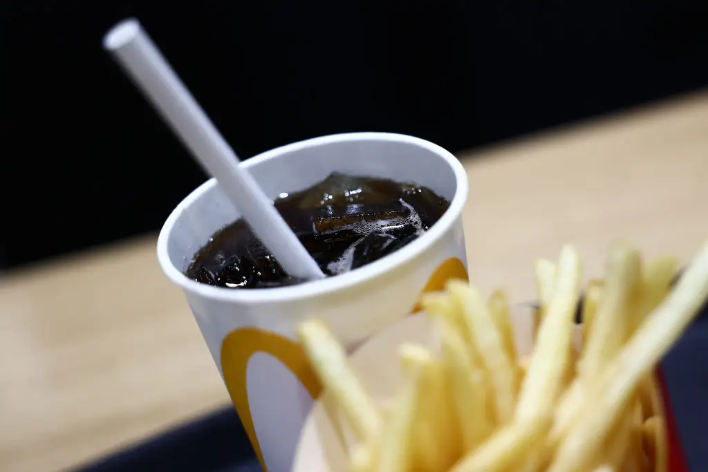 The 'McMigraine' - a large Coke and fries (Jakub Porzycki/NurPhoto via Getty Images)
