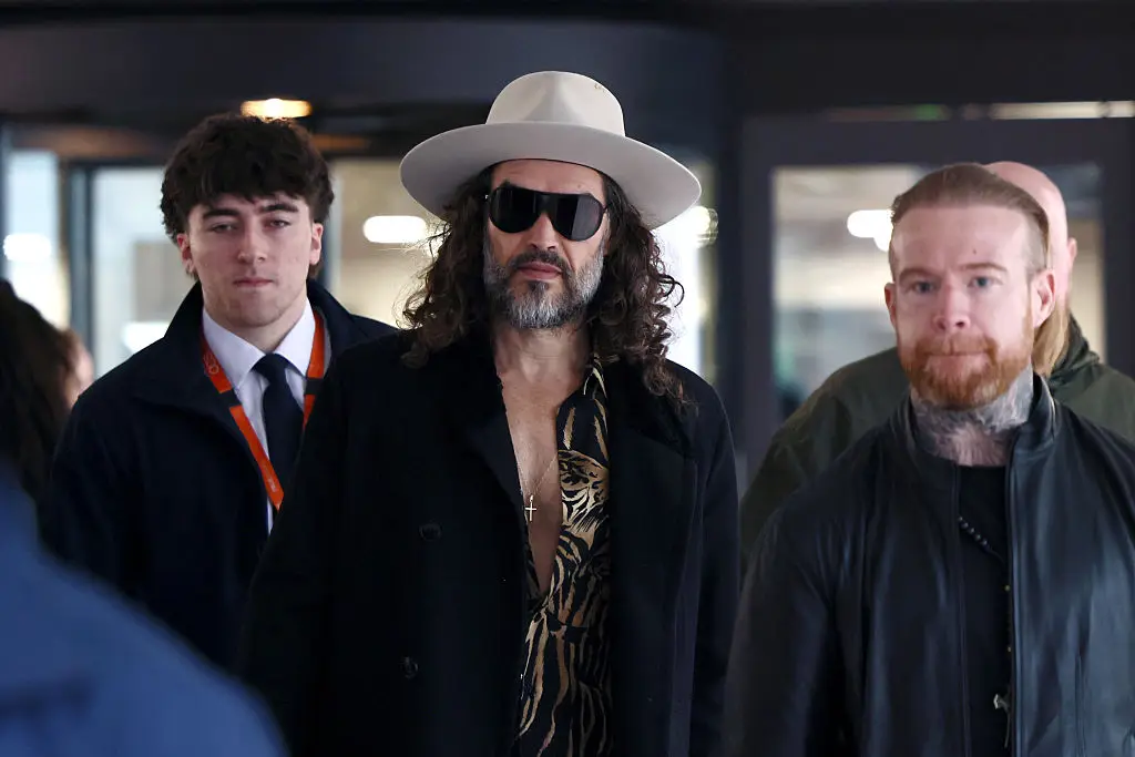 Russell Brand is accused of the rape and sexual assault of six women (Photo by Adrian DENNIS / AFP via Getty Images) 