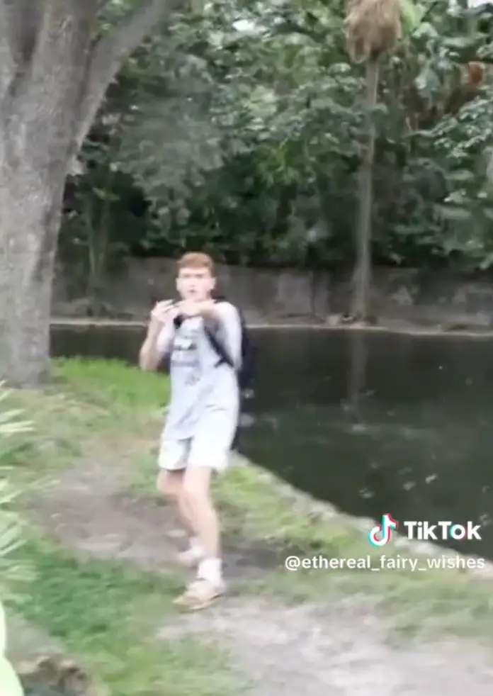 Loads of people gathered, with some asking him to get out of the enclosure.