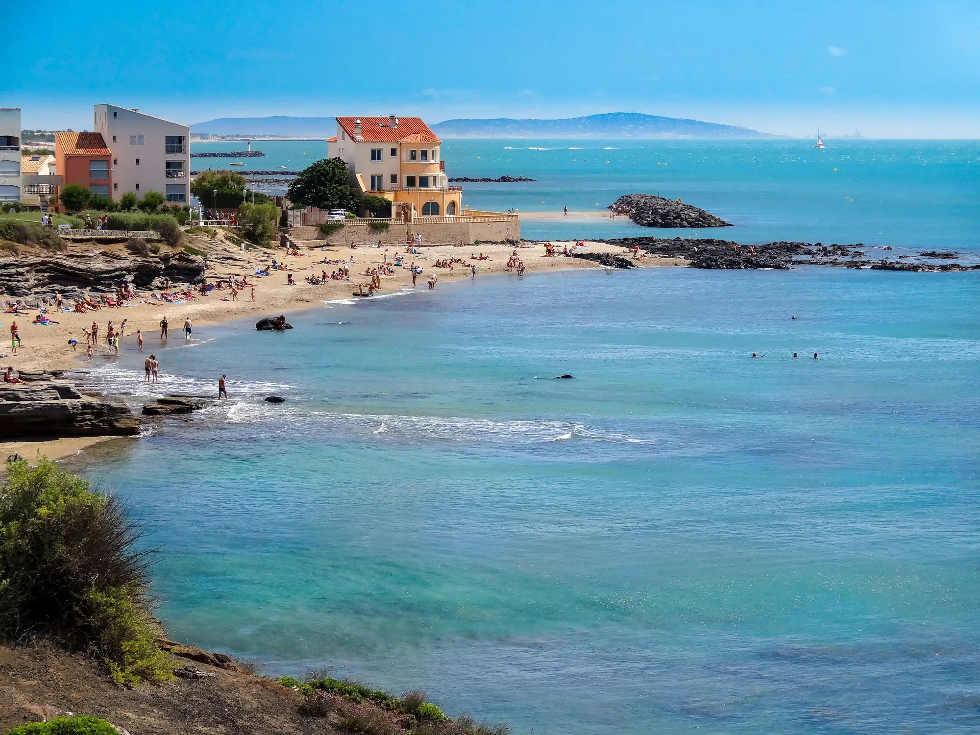 Visitors say the nudist village has been 'overtaken by swingers'