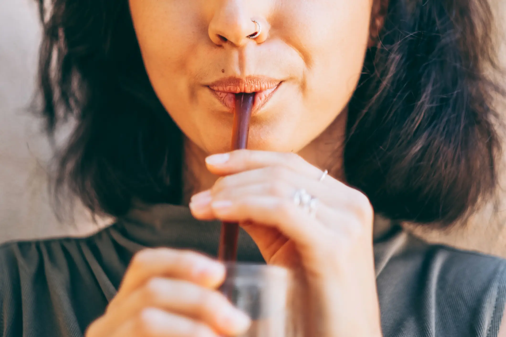 Doctors say consuming fizzy drinks can result in bloating and burping (Getty Stock)