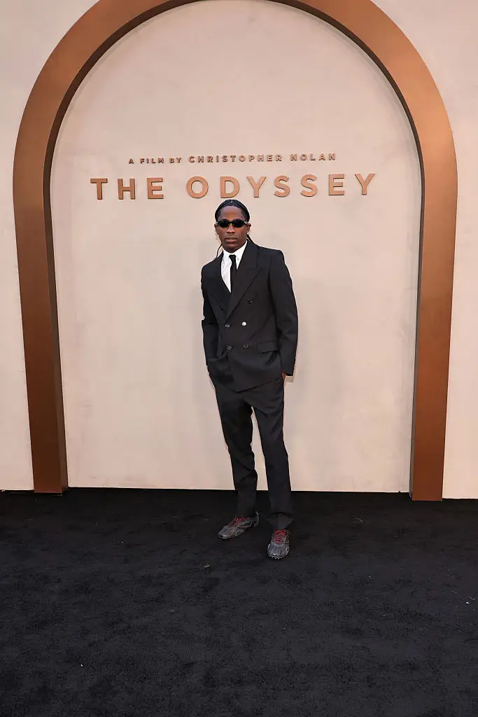 In an interview with TIME, Nolan explained why he wanted Travis Scott in The Odyssey: "I cast him because I wanted to nod towards the idea that this story has been handed down as oral poetry, which is analogous to rap," (Photo by Jamie McCarthy/Getty Images)