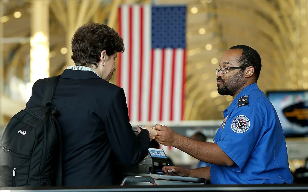 TSA officers have had their chairs removed (Photo by Win McNamee/Getty Images)