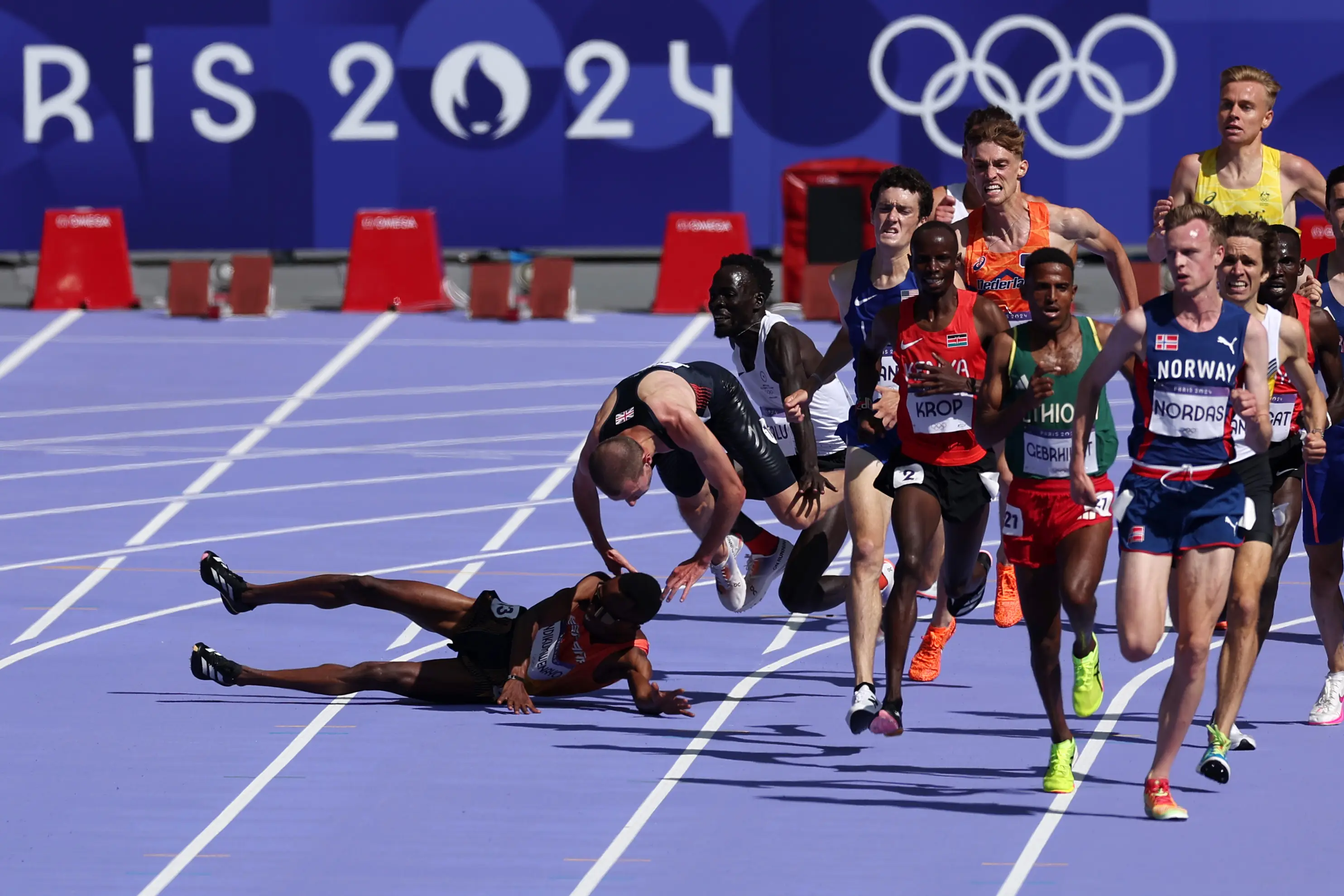 Several runners were knocked over. (Al Bello/Getty Images)