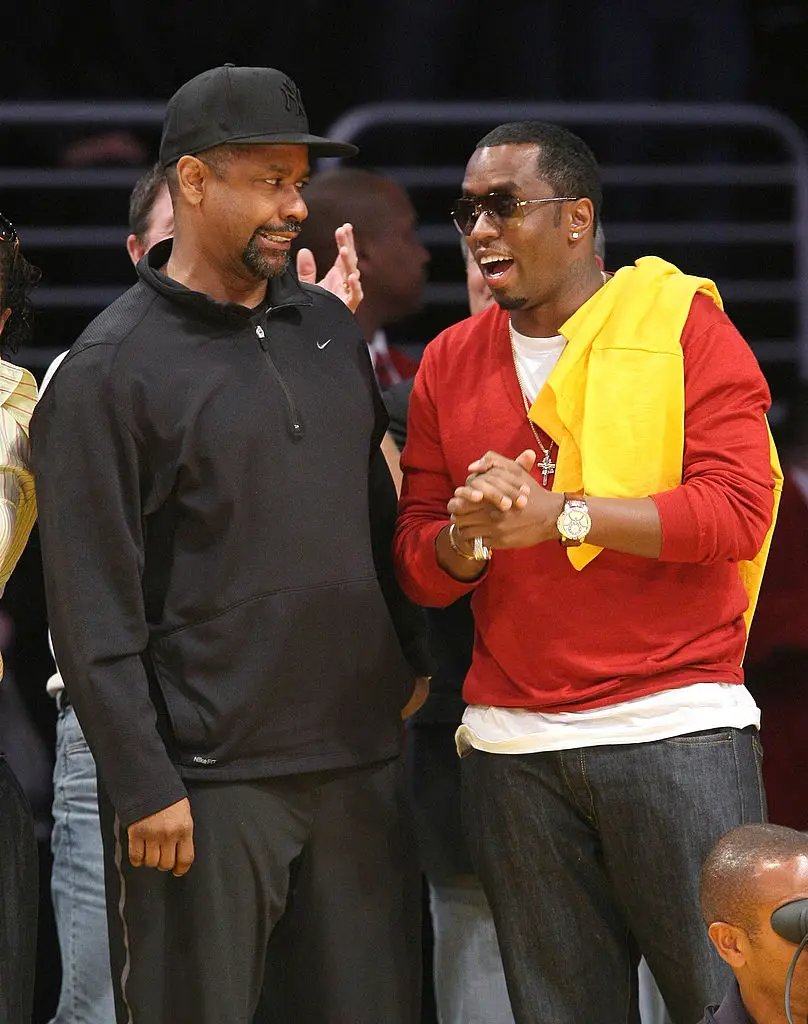 Denzel Washington, pictured with Sean 'Diddy' Combs at an LA Lakers game in 2008, reportedly gave the disgraced rapper a piece of his mind (Noel Vasquez/Getty Images)