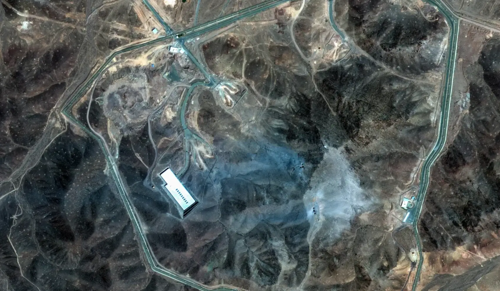 Ash can be seen covering the landscape in photos captured on June 22 (Maxar Technologies)