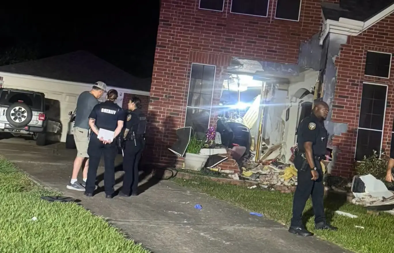Michael Butler was driving a Tesla Model 3 in Katy, Texas, on Friday evening when the car left the roadway and struck the house at a "high rate of speed" (Harris County Constable's Office Precinct 5)