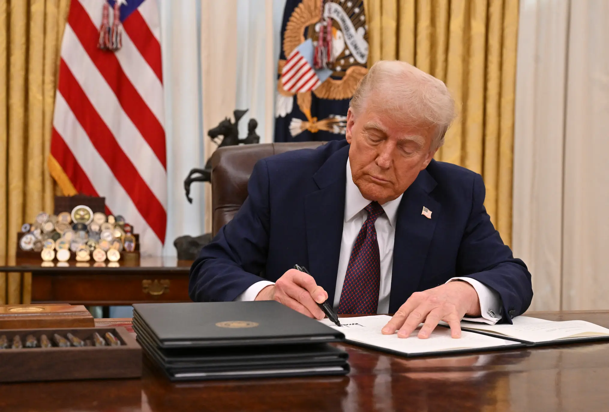 Donald Trump is restricting transgender care (ROBERTO SCHMIDT/AFP via Getty Images) 