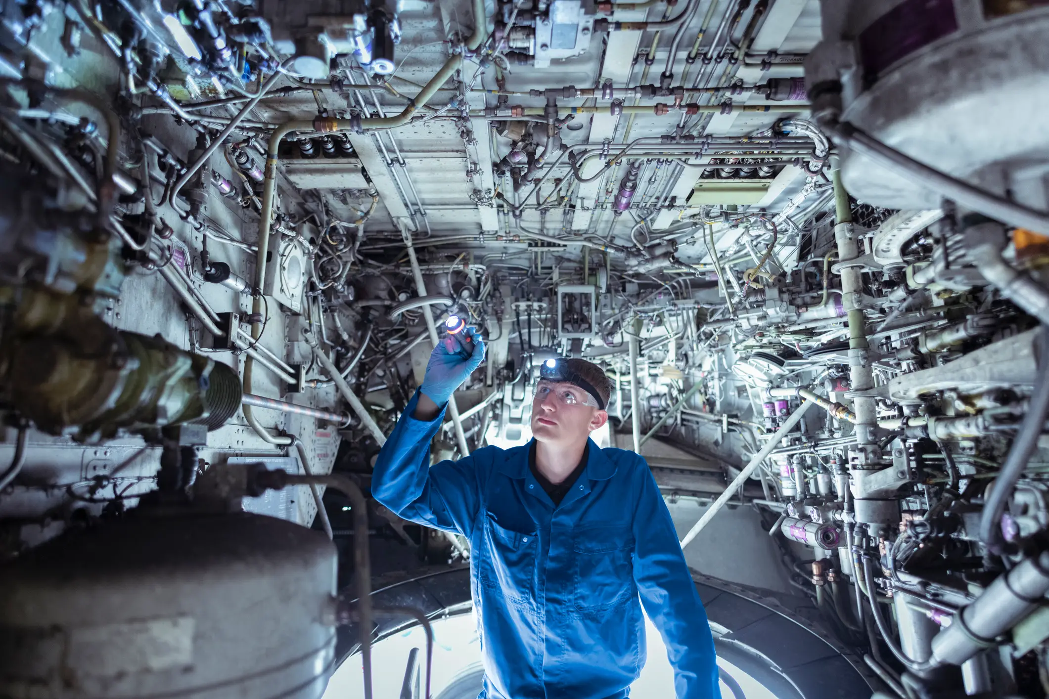 Inside the wheel well of a jet (Getty stock)